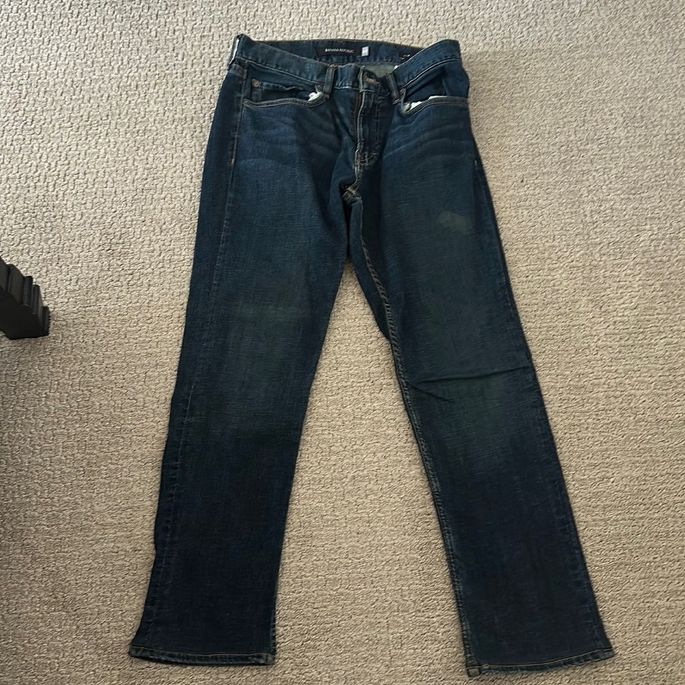 Banana Republic dark blue jeans. Nice slim fit jeans with small stain on front